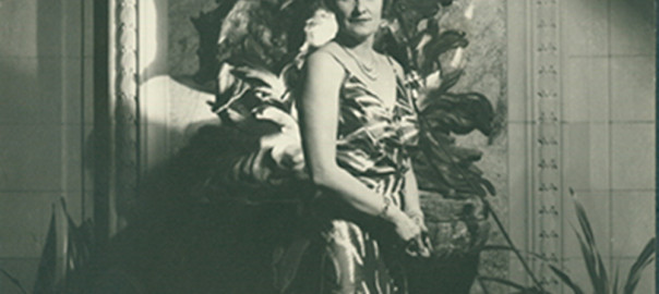 Marjorie in her New York home, 1934, Marjorie is wearing Evening dress, Maker Unknown, American, 1934, Grey and white fern pattern silk taffeta, red taffeta