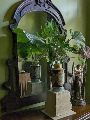 Victorian mirror, with urn filled with giant leaves